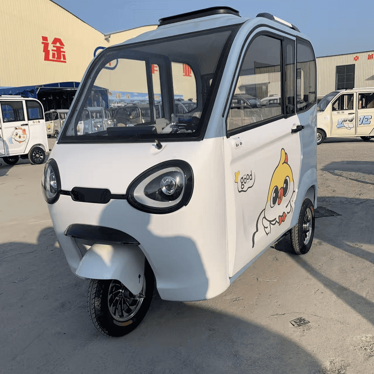 Wholesale 3-seat enclosed electric passenger trike. Features optional A/C & heater for Arctic/Desert campus transit. Inquire for factory FCL price today.
