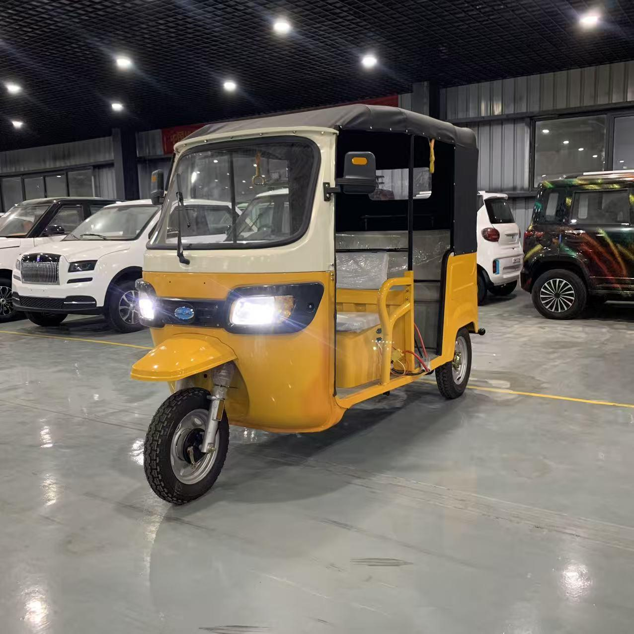 Wholesale 1500W enclosed electric passenger trike (3-seater). Features built-in cabin heater, Arctic-ready chassis, and solar options. Get FCL quotes today.